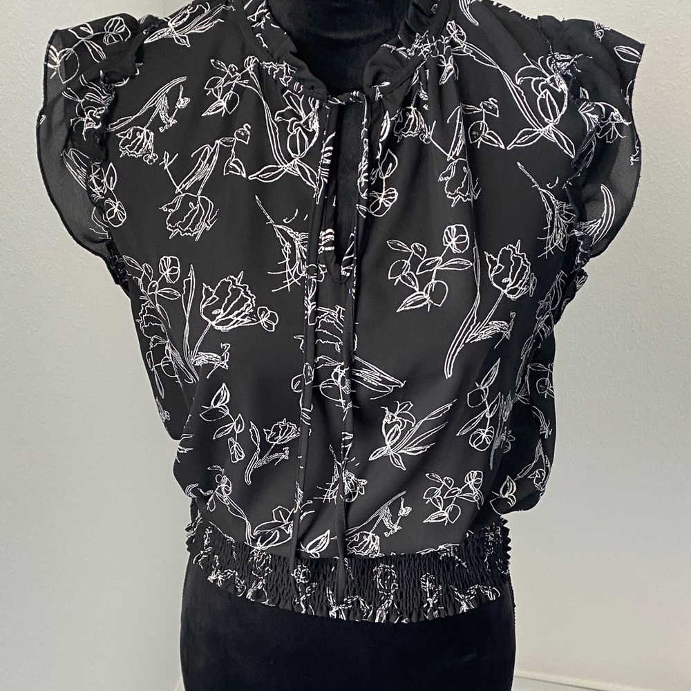 Elegant Black and White Floral Blouse